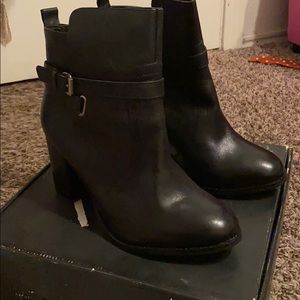 Black heeled booties *** never worn***